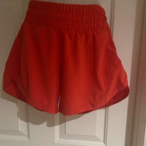 Red Lululemon shorts Hotty hot 4’